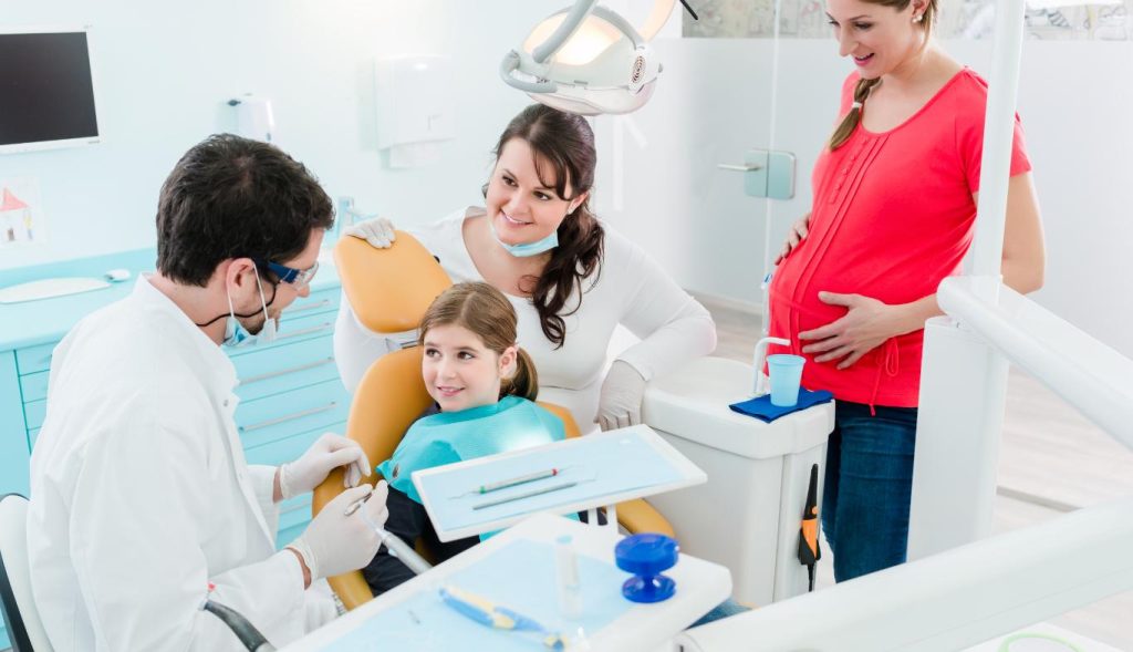 dental health tips for mother and daughter at the dentist together in tonbridge
